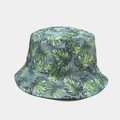 Blue reversible bucket hat featuring green tropical palm leaf and monstera prints - M (56-58cm) / Blue Tropical Leaves