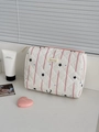Detail of pink starry geometric makeup bag with quilted fabric and zipper closure - Clutch Bag / Pink