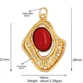 Macro view of gold copper mushroom pendant showing dimensions 28mm by 19mm with red stone - K325762-Gold Red Oval Gem