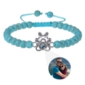 Detail of blue turquoise bead bracelet with custom paw print photo projection charm - Turquoise (Customized)