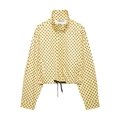 Detail of yellow polka dot crop jacket featuring a stand collar and adjustable drawstring - Yellow Polka Dot Top
