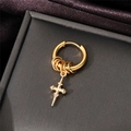Macro shot of a golden stainless steel cross pendant earring in a jewelry box - Pointed Cross / Single Piece