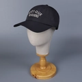 Detail of black nylon baseball cap with white Antique Old-Fashioned embroidery text - M (56-58cm) / Black