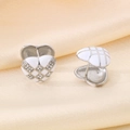 Macro detail of heart-shaped earrings with white enamel checkerboard and inset crystals - Steel & White Checkerboard Heart Style (KE116431-KFC)