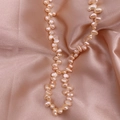 Baroque irregular freshwater pearl necklace with elegant pink satin silk texture - Pink