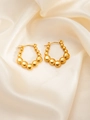 Detailed close-up of golden beaded hoop earrings with star elements on beige silk - Gold Graduated Beaded Hook Earrings (BJGE0278)