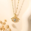 Vergoldete Evil Eye Halskette mit blauen und klaren Zirkonia-Steinen an feiner Kette - Gold Augenform Böser Blick