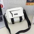 Bolso bandolera de lona blanca con correa ajustable y hebillas de plástico - Blanco