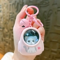 Pink cartoon cat astronaut keychain with matching bell and silicone strap charm - Glowing Cat Backpack - Pink