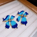 Blue gradient flower tassel earrings with gold trim and glaze finish on white fabric - Gold Blue Gradient Flower Studs