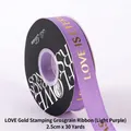 2.5cm light purple grosgrain ribbon with gold-stamped 'LOVE IS ETERNAL' text - 2.5cm Wide x 30 Yards Long / Light Purple