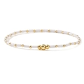 Minimalistisches handgefertigtes Perlenarmband mit weißen Perlen und Goldakzenten - Weiß
