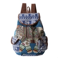 Detail view of ethnic canvas backpack featuring blue elephant patterns and flap pockets - 40x30x16cm / Blue Elephant Double Back Style