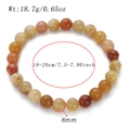 Detail showing 8mm natural stone beads bracelet specs with weight and size measurements - 8mm Beads / Gold Silk Jade (AB855-03)