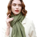 Green cashmere-feel winter shawl wrap for women worn by a model with a white coat - 180cm / Matcha Green