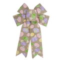 Detail of burlap Easter bow featuring colorful egg and butterfly prints on natural texture - Linen Easter Egg Style