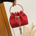 Elegant red rhinestone bucket bag with golden round handle and fringe tassel detail - Red