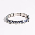 Macro shot of silver stainless steel Italian charm bracelet with blue and white enamel - Classic Italian Blue & White (Style 9)
