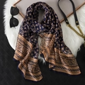 Navy and gold geometric print chiffon scarf displayed on white plush faux fur background - Navy Blue Gold Geometric