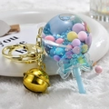 Cute lollipop keychain with blue liquid glitter and golden bell bag pendant accessory - Bell Style [Blue]