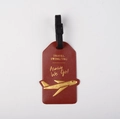 Red faux leather airplane luggage tag with gold TRAVEL text and black adjustable strap - Burgundy