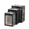 Three black marble gift bags with transparent windows in various sizes and carry handles - Black Marble Pattern