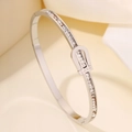 Silver stainless steel bracelet with row of sparkling zircons and horseshoe buckle design - Silver LOVE Bangle