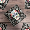 Halloween napkins with colorful sugar skull and floral patterns on black background - Spider Web Skull