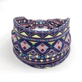 Navy blue elastic headband featuring a vibrant orange and teal African tribal pattern - Style 12