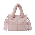 Quilted padded crossbody shoulder bag in soft pink finish with adjustable wide strap - Pink