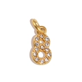 Macro shot of gold number 8 pendant with micro-pave white rhinestones for jewelry DIY - Number 8 / Gold