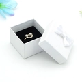 White textured jewelry box with a silk bow featuring a golden bow ring inside - 5*5*3.5CM / White