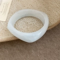 Detail of white resin geometric bangle with thick irregular square edge design - Simple Rounded Style / Translucent Blue