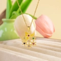 Golden snowflake pendant necklace with multicolor zircon stones and gold cross chain - Christmas Snow / Gold