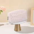 Pink mesh makeup bag with daisy embroidery and zipper closure for travel storage - Purple Flower Style