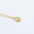 Close-up of golden heart lock pendant with beaded edge and fine chain details - Heart Lock / Gold