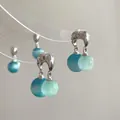 Close-up of hoop earrings with dual blue and mint green translucent resin beads - 7# Silver Earring Post - Blue & Green - Double Bead Drops
