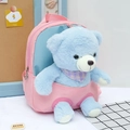 Pink and blue toddler backpack featuring a removable cute blue plush teddy bear toy - Pink