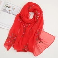 Detailed embroidery of delicate floral patterns on lightweight red chiffon sun shawl - Red