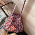 Close-up of vintage floral canvas tote bag with red and pink rose print on rustic background - Single Layer Thin Style (Single-strap Single-layer)