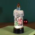 Christmas snow globe candle light featuring Santa Claus and colorful glitter - Water-filled Snow Globe Santa Claus