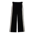 Détail du jogging en velours noir avec bandes blanches latérales et taille élastique - Bas