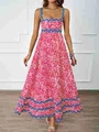 Dettaglio di un abito lungo boho rosa con stampa floreale strisce blu e design a spalline - S / Rosso a pois