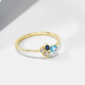 Macro detail of gold plated 925 silver ring with colorful zircon stones and 925 stamp - US 5 / Gold