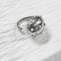 Adjustable silver finish teardrop ring featuring embedded white pearl accents and polished surface - Silver Pearl