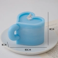 Sky blue heart-shaped scented candle with matte texture and unique curved handle - Mug Shape (Rosemary Mint)