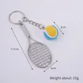 Mini tennis racket and ball keychain with size measurements and blue yellow ball design - 2cm Small (Blue + Yellow) Dual-tone Tennis Ball + Silver Racket