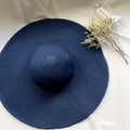 Navy blue wide brim straw sun hat with woven texture on soft white fabric background - M (56-58cm) / Navy Blue