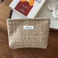 Makroaufnahme der Webstruktur und Simple Wish Label auf beigem Tweed Kosmetiktasche - Camel