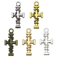Vijf vintage slangenkruis hangers in antiek zilver en goud metalen afwerkingen - Touw Omwikkeld Kruis 26x12mm